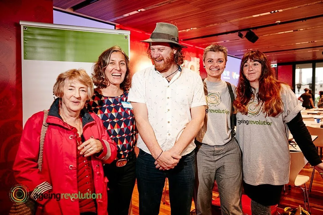 Leonie Sanderson and Simon Lowe with The Ageing Revolution team at one of its events.
