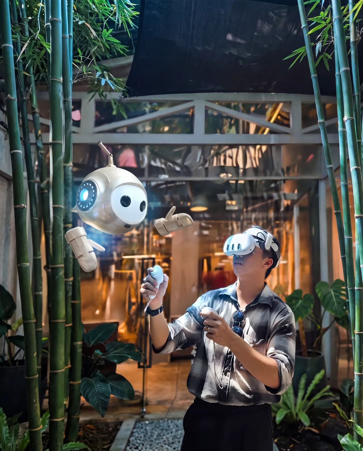 A person wearing a Quest 3 headset in a bamboo courtyard, with the PTR robot hovering beside them.