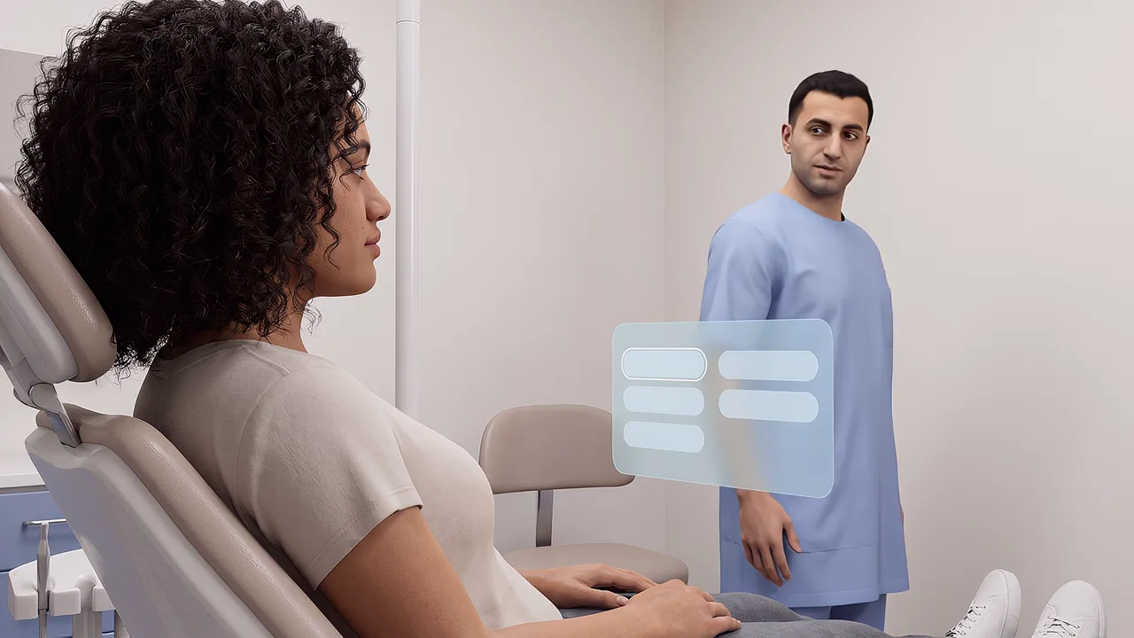 A patient sits with a dental assistant nearby. A first person VR training scenario for healthcare, seen through the headset.