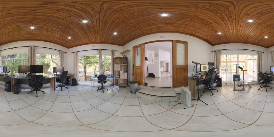 The Poly Haven studio. The whole 360 sphere of the scene unwrapped into one wide strip, as the viewer stores it.