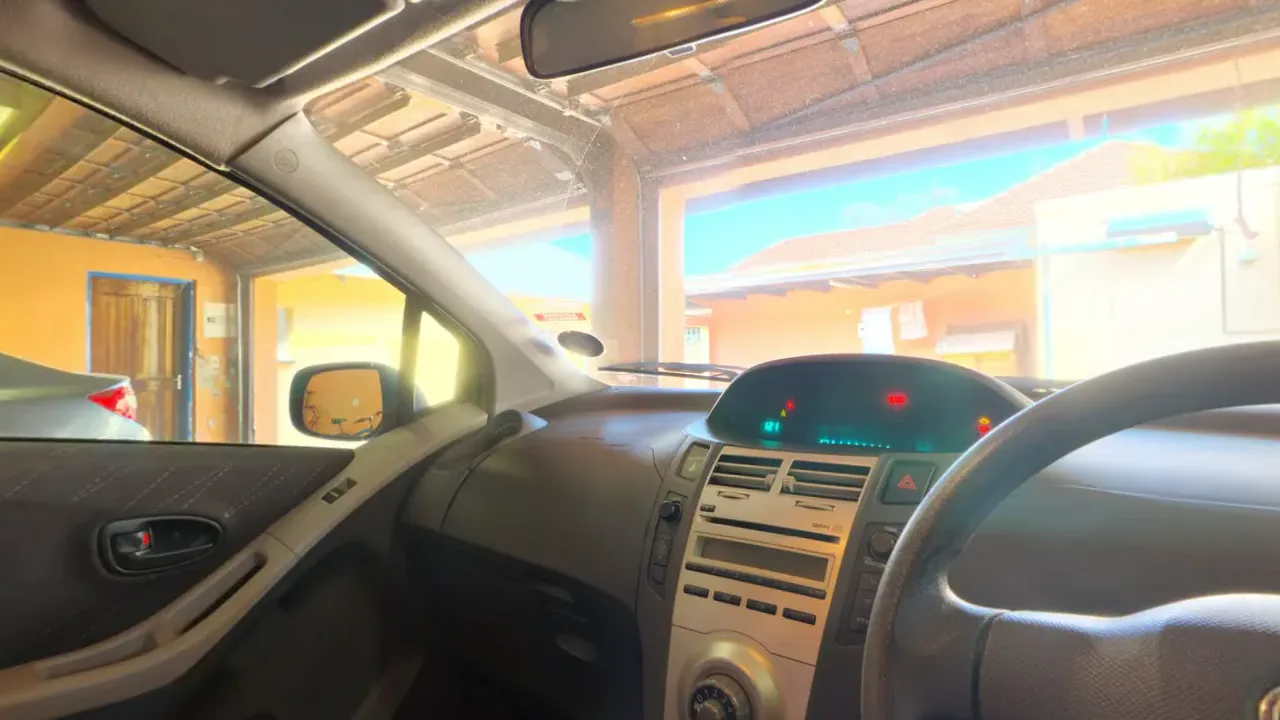 A car interior in a garage. A looping 360 scene built as a Fast Builds 360 experience, shown flat.