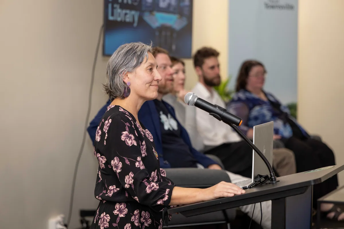 Leonie Sanderson at the microphone. PTR VR Library public launch at Smart Precinct NQ, Townsville, 18 July 2024.